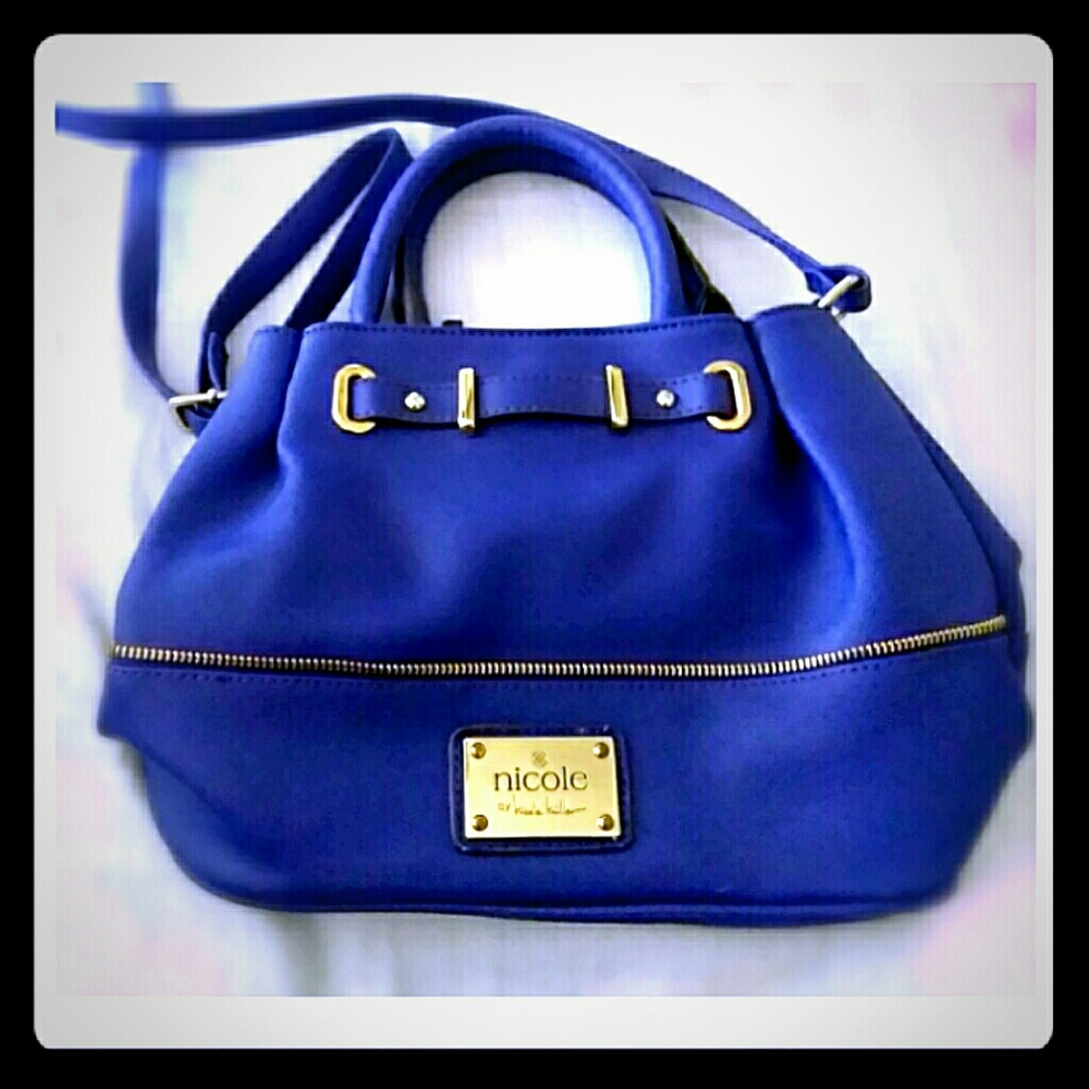 Nicole Miller navy blue small bucket style purse
